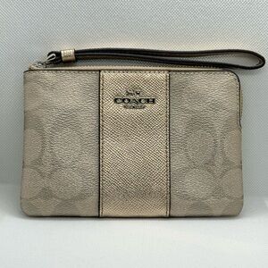 NWOT. Coach Corner Zip Wristlet In Signature Canvas With Stripe